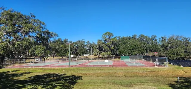 a view of swimming pool with a yard