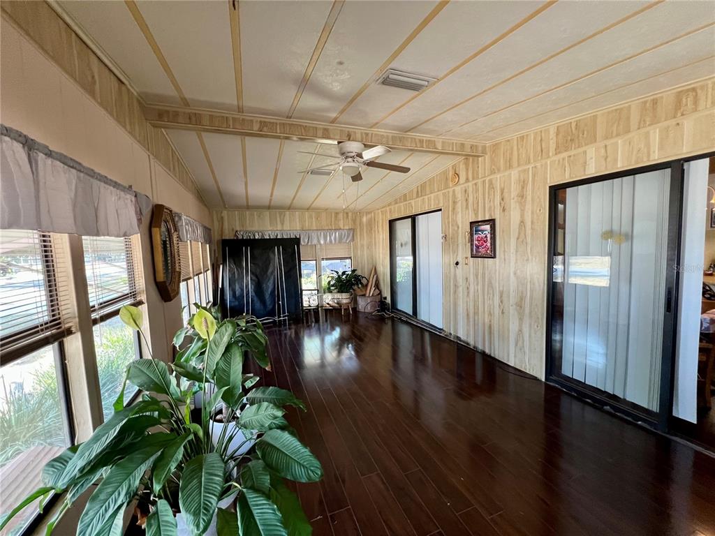 27 Robin Road Wildwood, FL 34785 - Photo 3 of 16 a view of interior space with wooden floor and windows