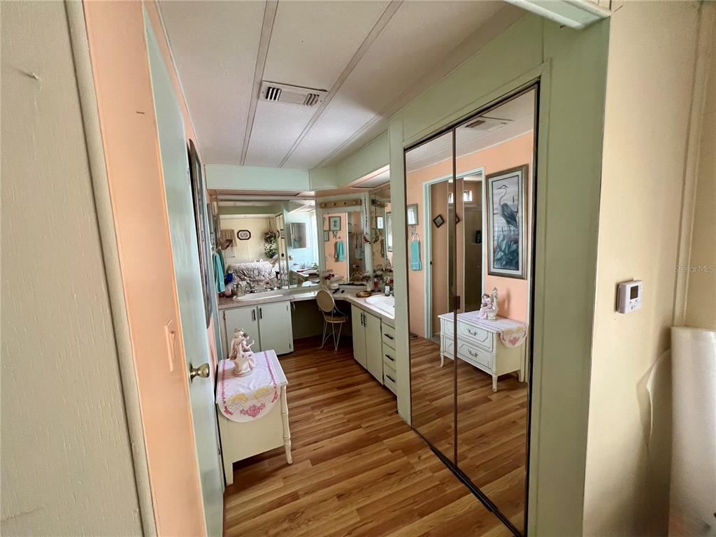 27 Robin Road Wildwood, FL 34785 - Photo 6 of 16 a kitchen with stainless steel appliances granite countertop a refrigerator and a sink