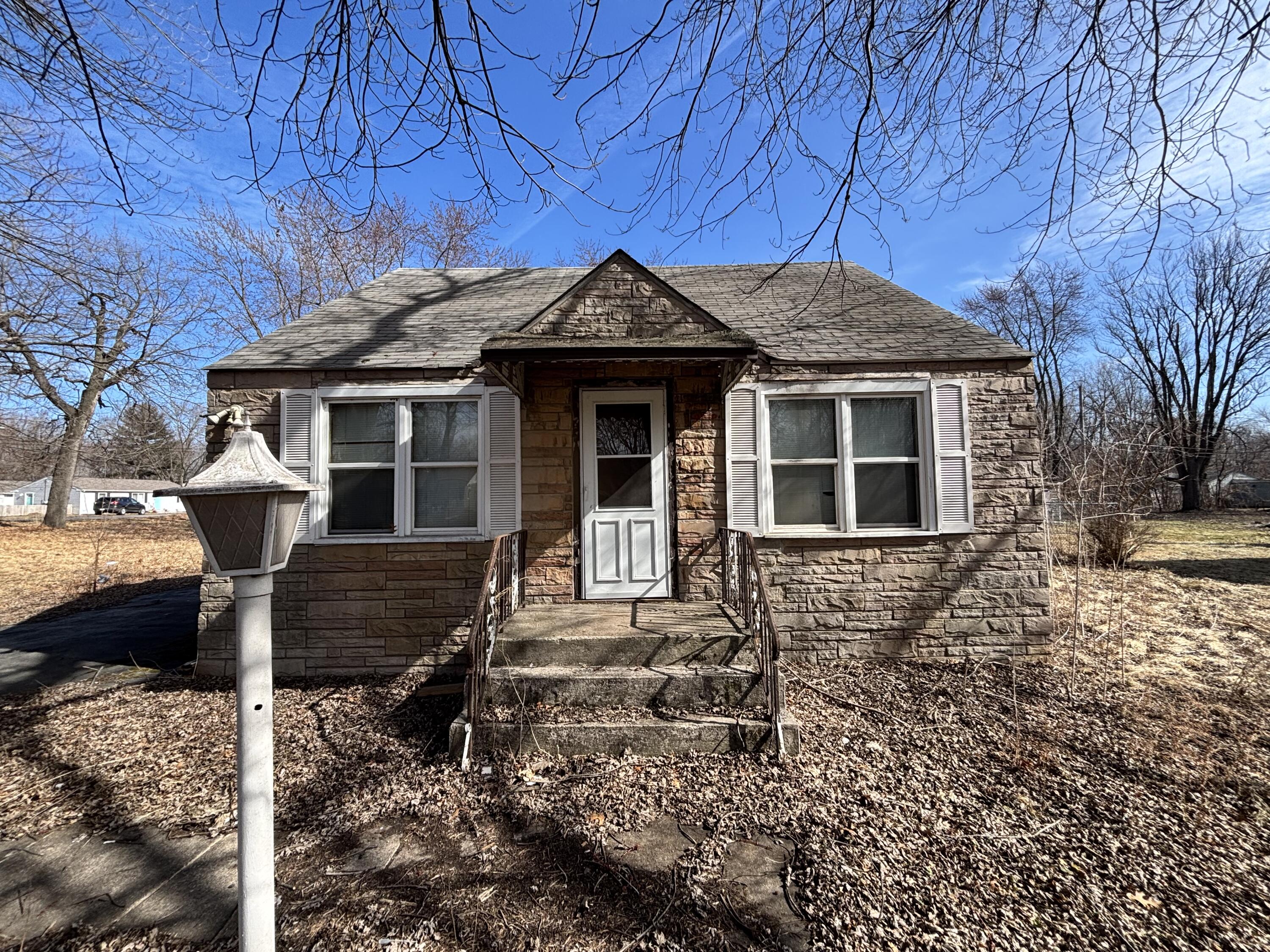 2407 Hanley Street Gary, IN 46406 - Photo 2 of 12 a front view of a house with garden
