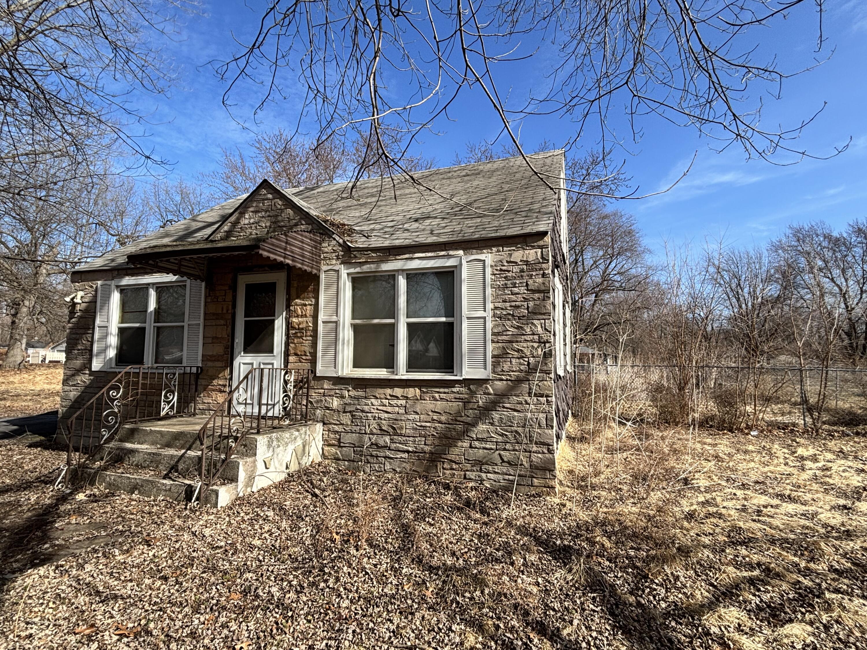 2407 Hanley Street Gary, IN 46406 - Photo 3 of 12 a front view of a house with a yard