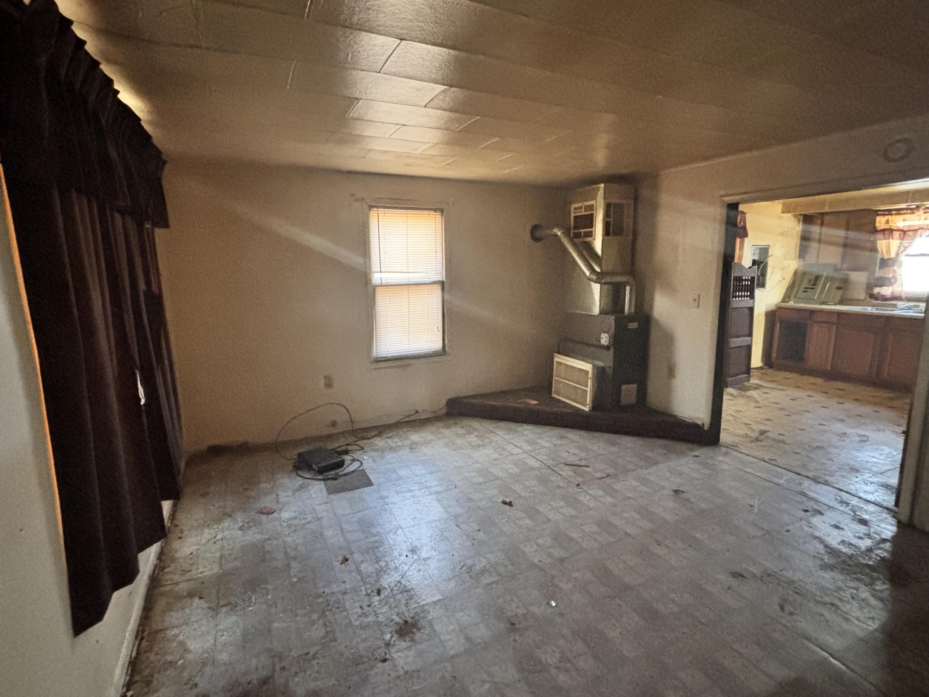 2407 Hanley Street Gary, IN 46406 - Photo 6 of 12 an empty room with windows