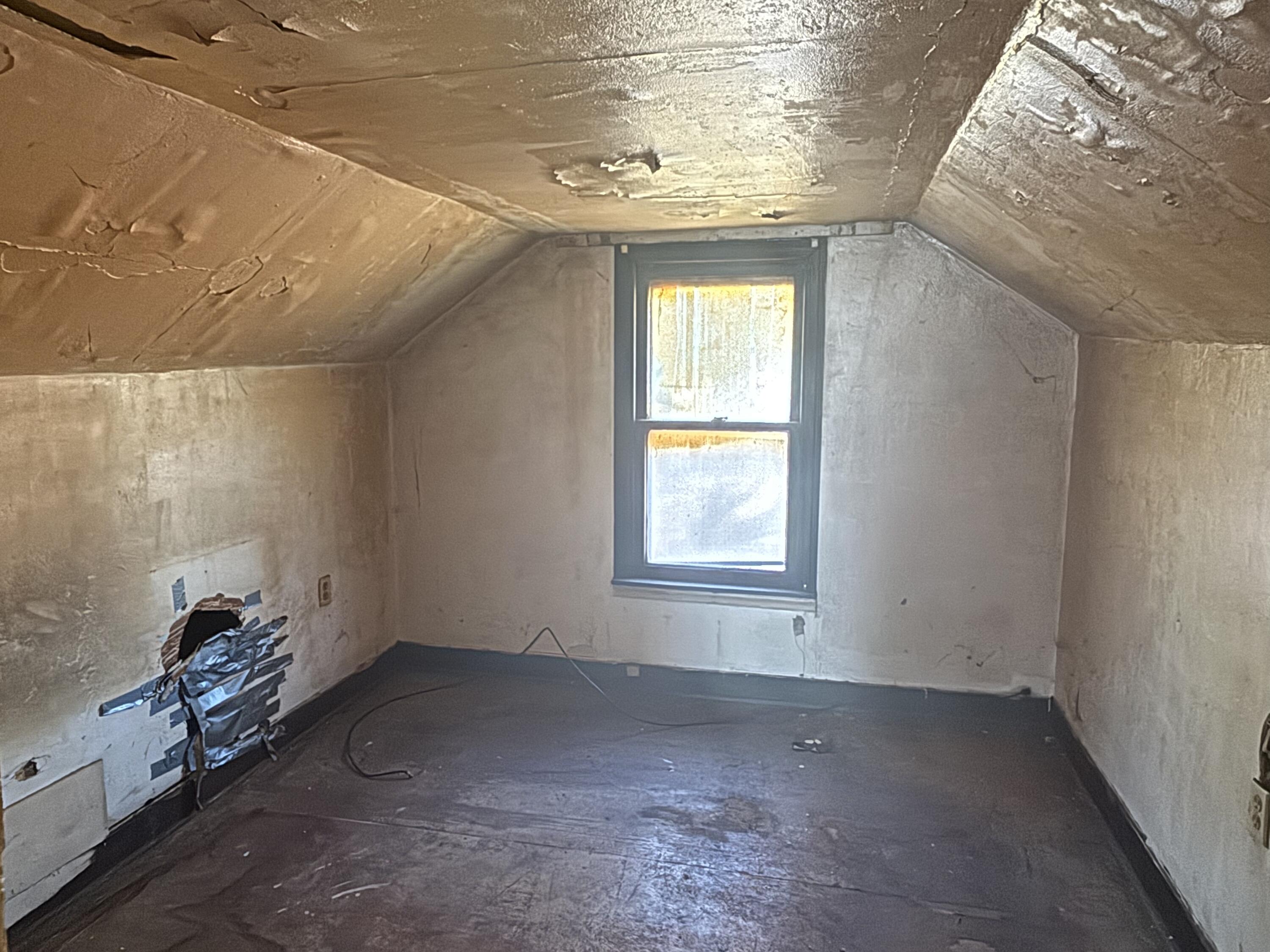 2407 Hanley Street Gary, IN 46406 - Photo 8 of 12 a view of room with window and hardwood floor