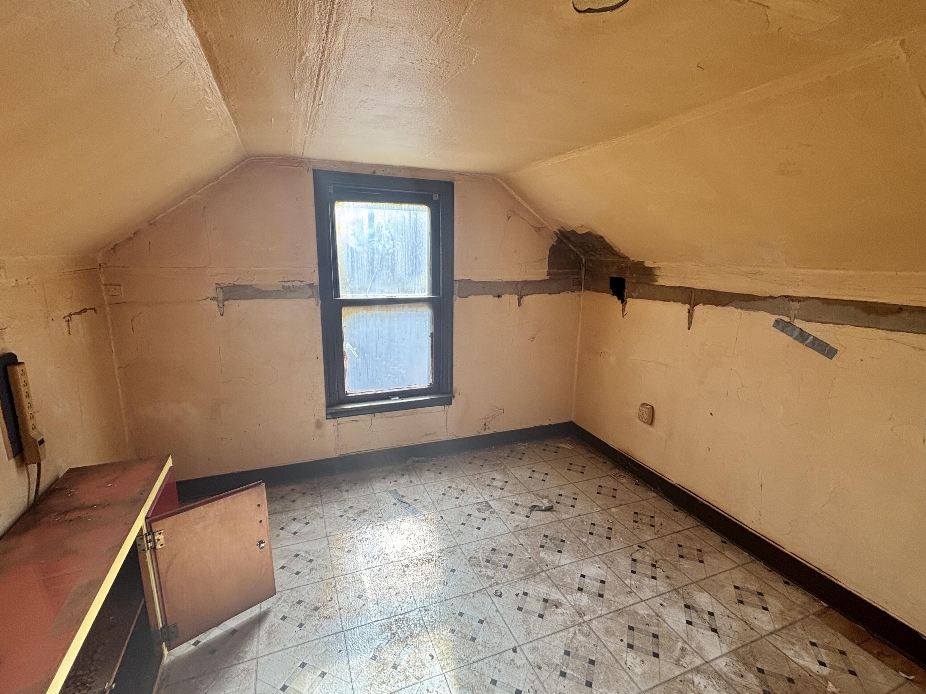 2407 Hanley Street Gary, IN 46406 - Photo 9 of 12 an empty room with windows