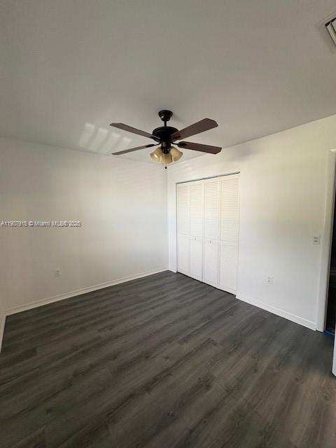 1141 Southwest 111th Way Davie, FL 33324 - Photo 16 of 19 an empty room with wooden floor fan and windows