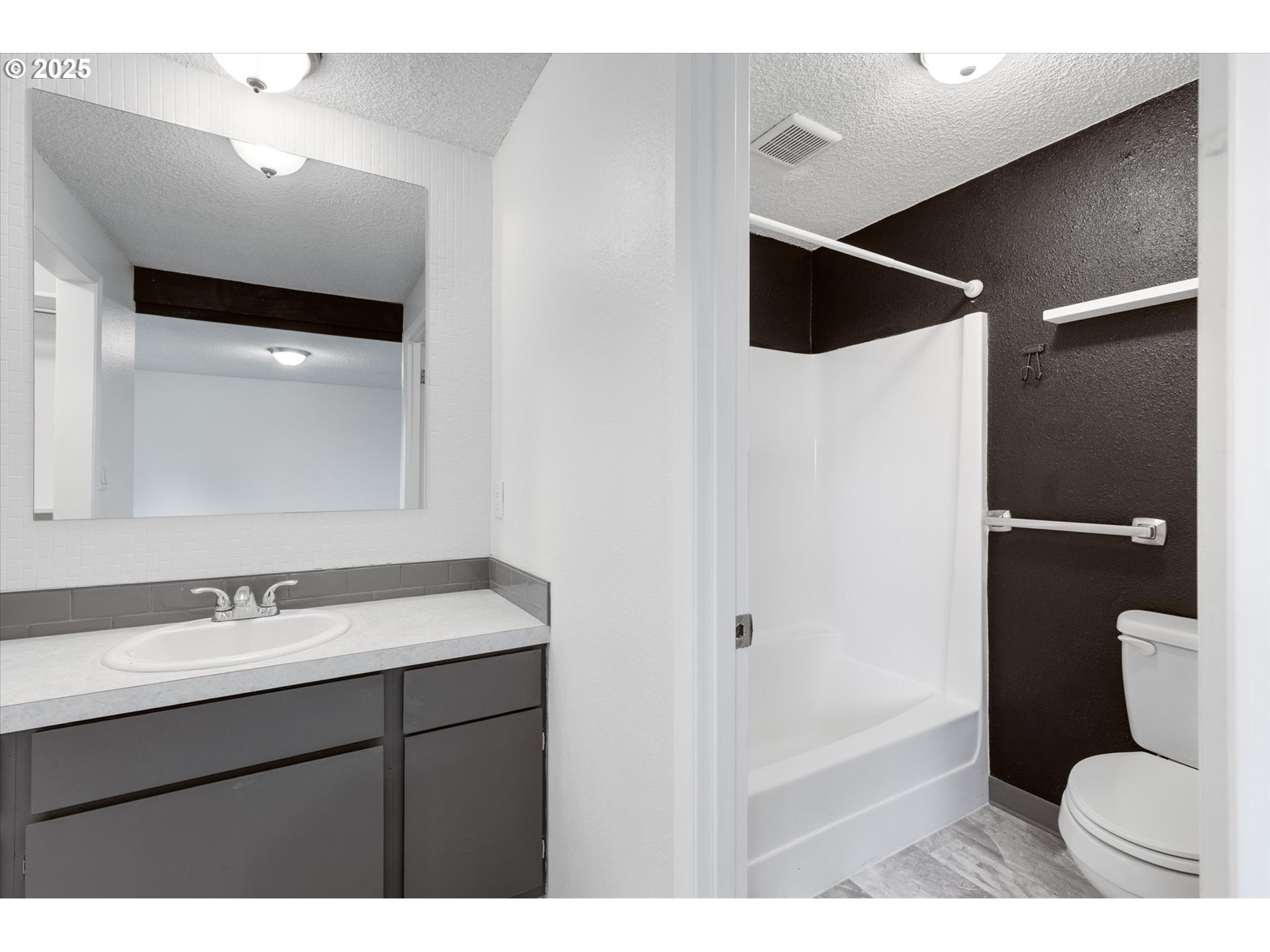 9 Lee Place Longview, WA 98632 - Photo 31 of 46 a bathroom with a sink a toilet and shower