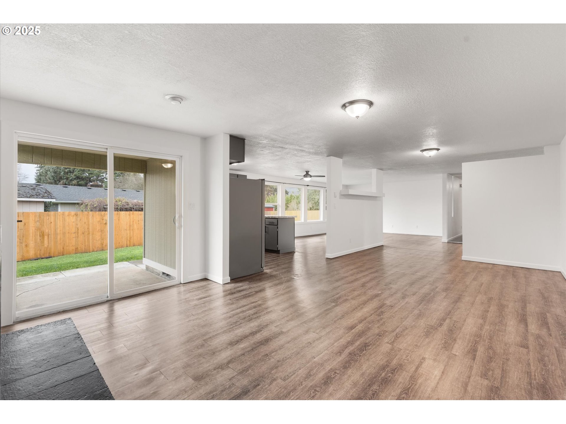 9 Lee Place Longview, WA 98632 - Photo 8 of 46 wooden floor in an empty room with a window
