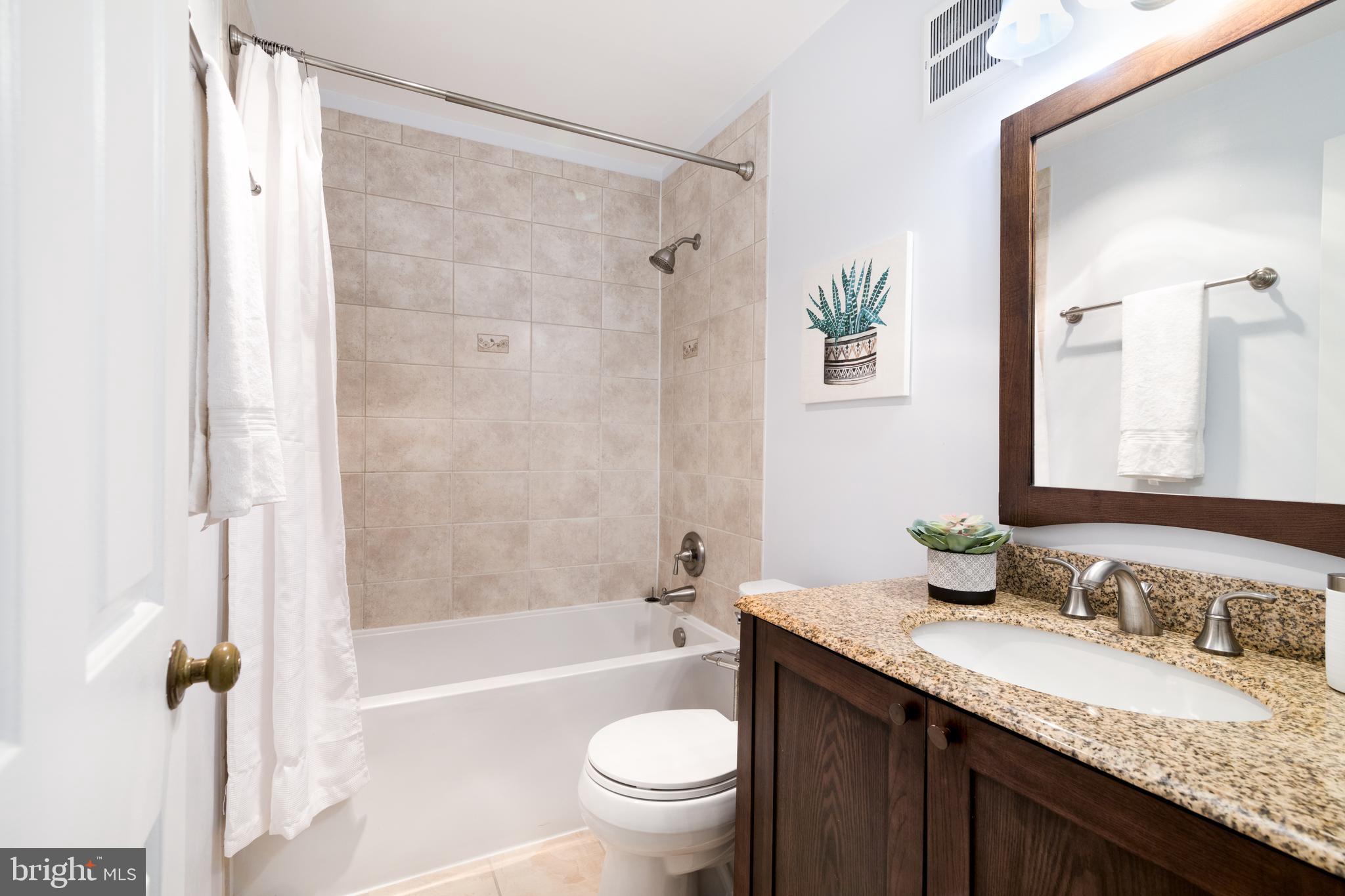 3205 Sutton Place Northwest, Unit D Washington, DC 20016 - Photo 18 of 29 Ensuite bath