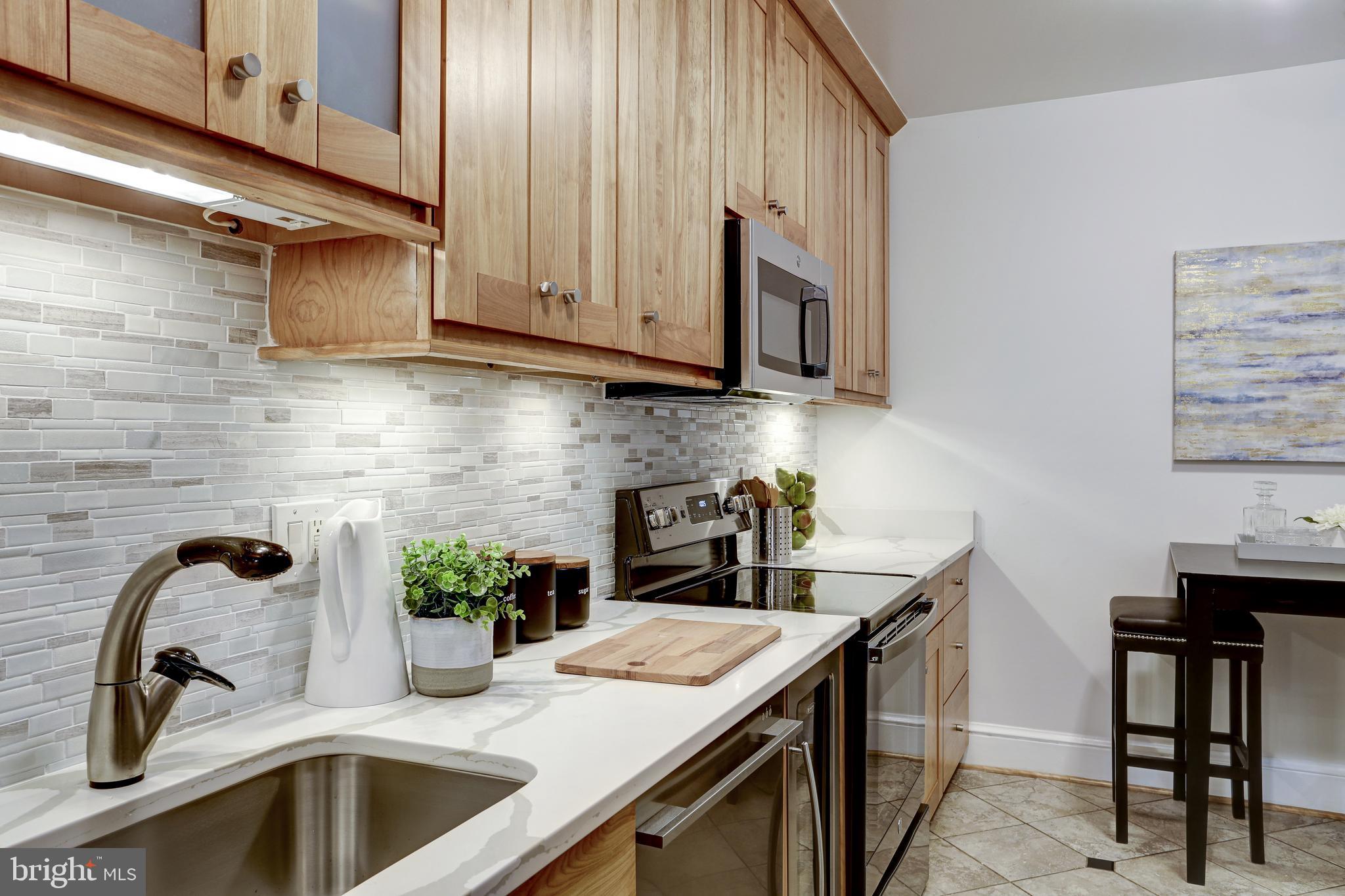 3205 Sutton Place Northwest, Unit D Washington, DC 20016 - Photo 9 of 29 Updated kitchen