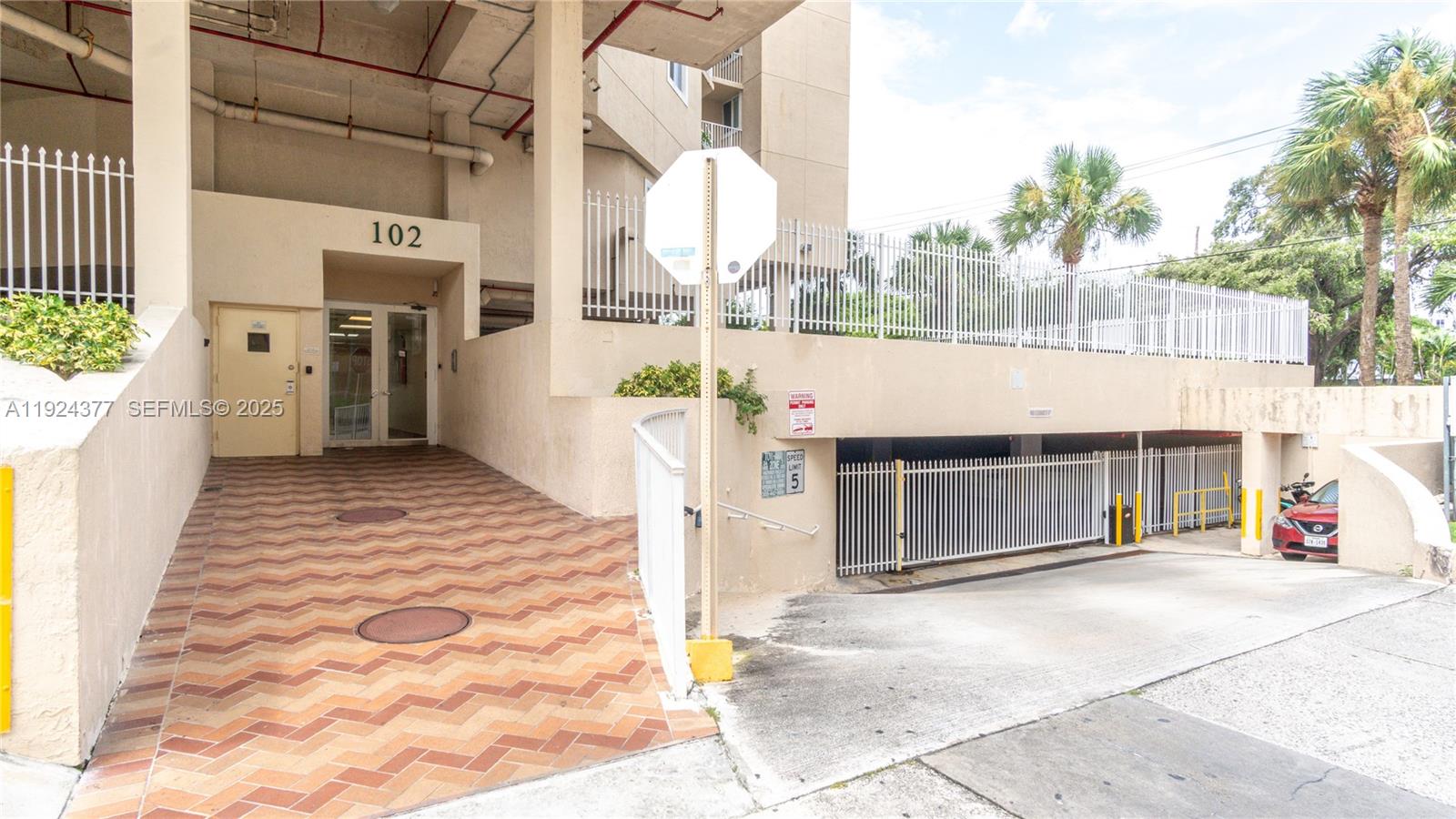 102 Southwest 6th Avenue, Unit 401 Miami, FL 33130 - Photo 11 of 15 a view of a entryway door of the house