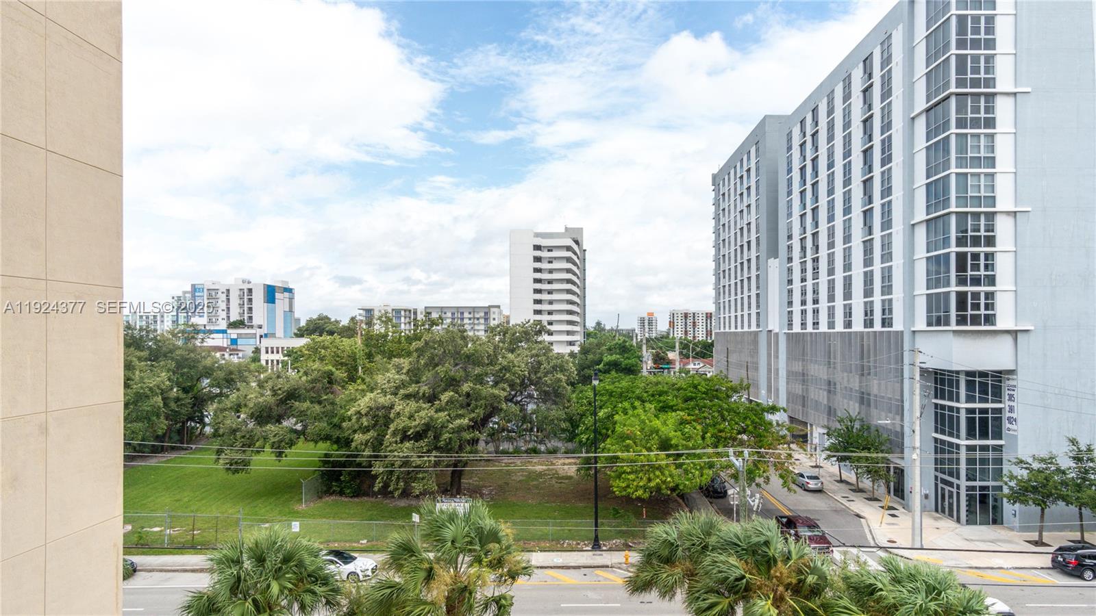 102 Southwest 6th Avenue, Unit 401 Miami, FL 33130 - Photo 14 of 15 a view of a city with tall buildings and a lake view