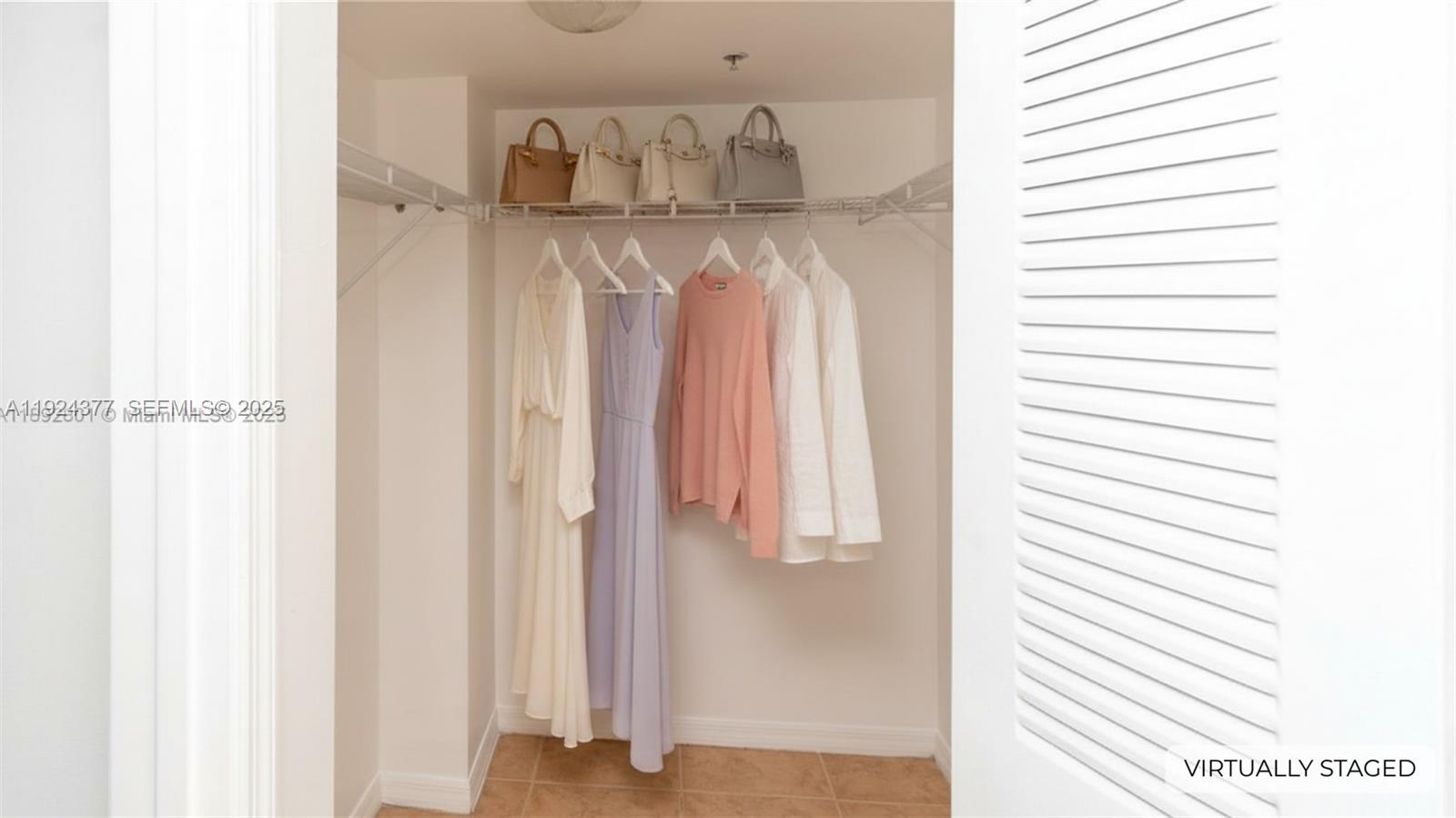 102 Southwest 6th Avenue, Unit 401 Miami, FL 33130 - Photo 10 of 15 a close view of walk in closet