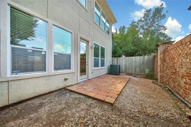 a view of backyard with cabin