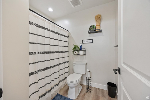 754 West 400 North, Unit 29 Mapleton, UT 84664 - Photo 16 of 25 Full bath featuring a shower with curtain, light wood-style floors, and recessed lighting