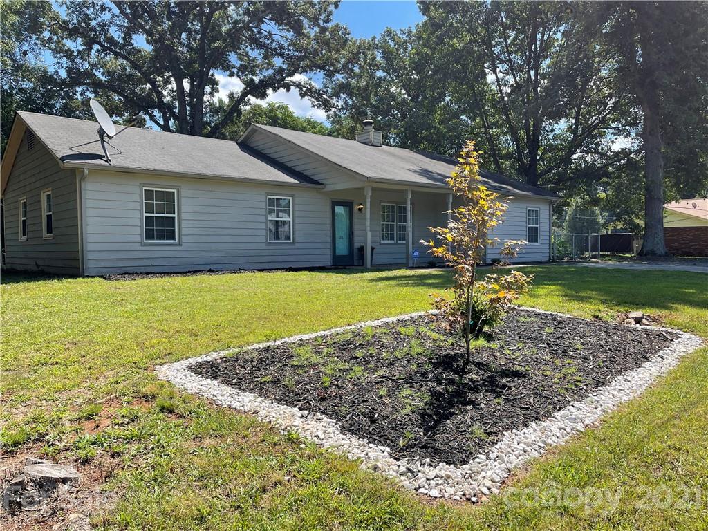 126 Sparrow Road Statesville, NC 28625 - Photo 2 of 29 a front view of a house with garden