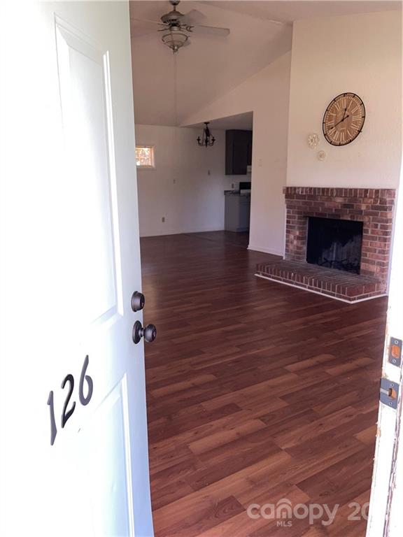 126 Sparrow Road Statesville, NC 28625 - Photo 25 of 29 a view of a livingroom with wooden floor