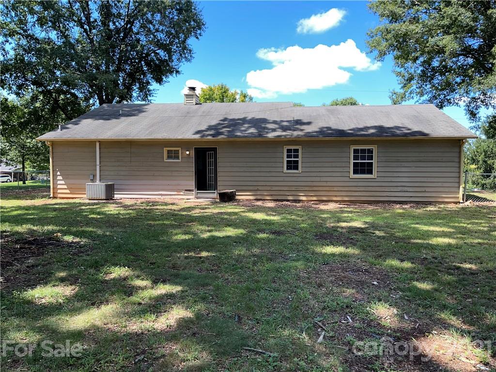 126 Sparrow Road Statesville, NC 28625 - Photo 29 of 29 a front view of house with yard and trees
