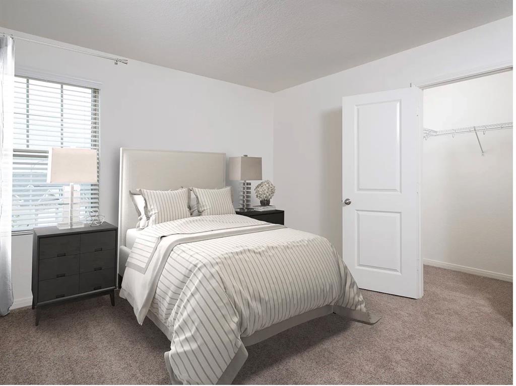 2012 Prairie Lane Melissa, TX 75454 - Photo 13 of 24 a bedroom with a bed and a window