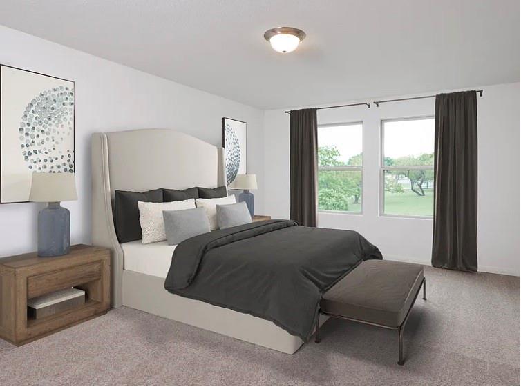 2012 Prairie Lane Melissa, TX 75454 - Photo 15 of 24 a bedroom with a bed and a couch