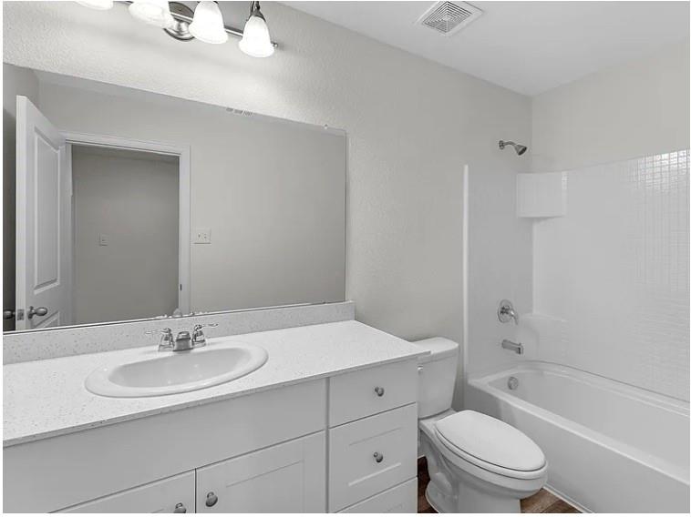 2012 Prairie Lane Melissa, TX 75454 - Photo 2 of 24 a bathroom with a sink toilet and shower
