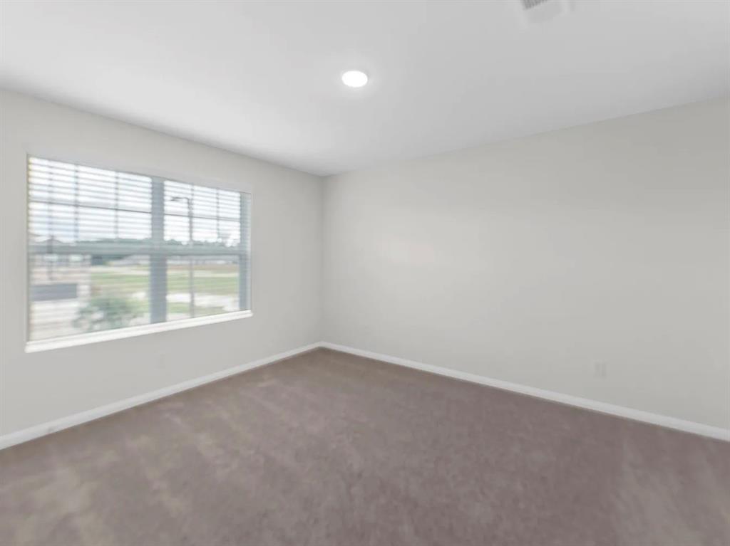 2012 Prairie Lane Melissa, TX 75454 - Photo 4 of 24 an empty room with a window