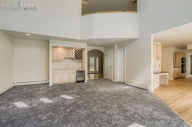 wooden floor and a fireplace in a room