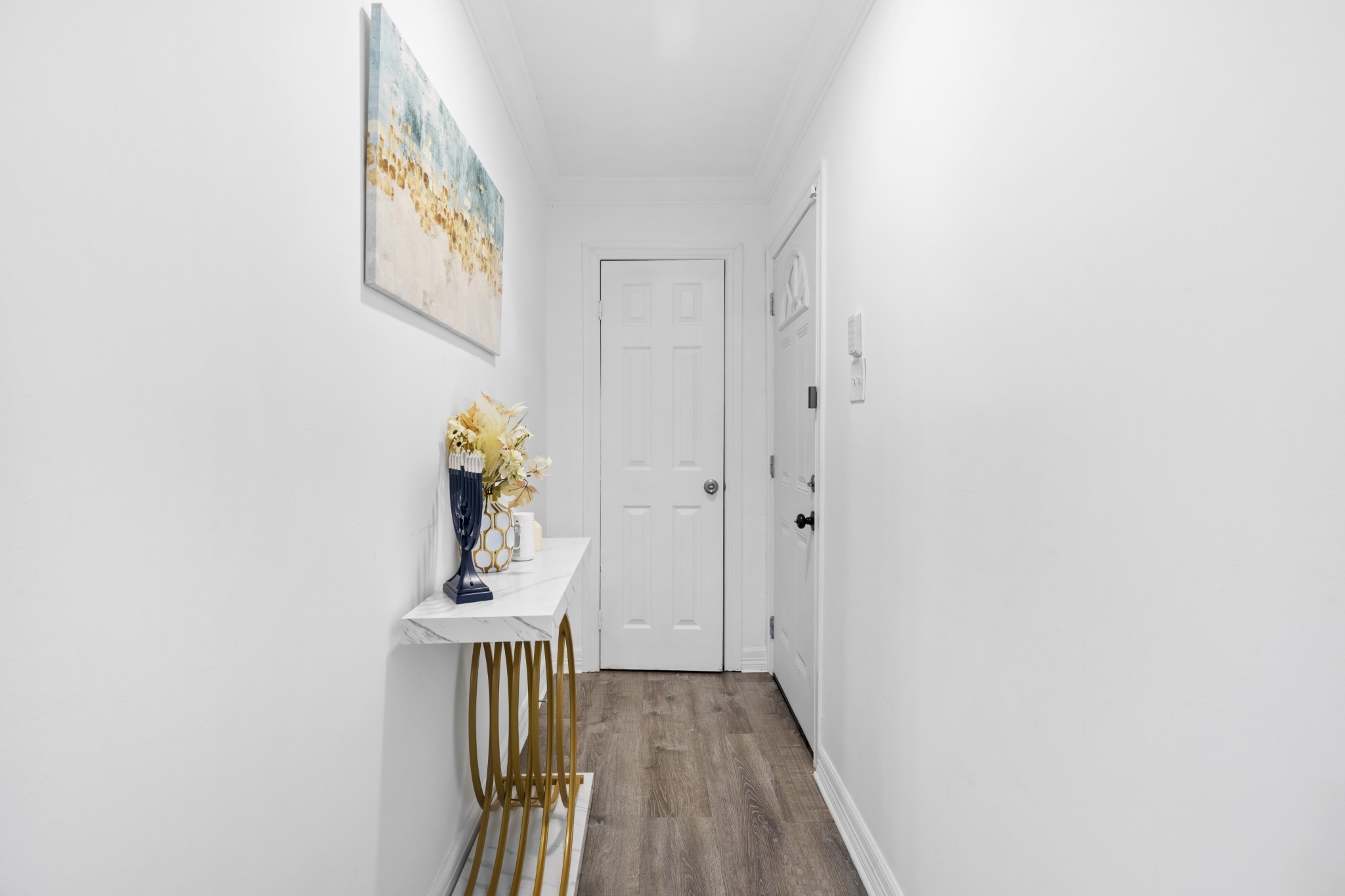 3823 Shadow Trail Houston, TX 77084 - Photo 7 of 29 a view of a hallway with wooden floor