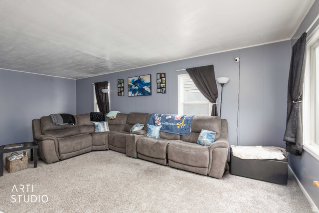 875 Patterson Street Ogden, UT 84403 - Photo 2 of 38 Living room with carpet flooring