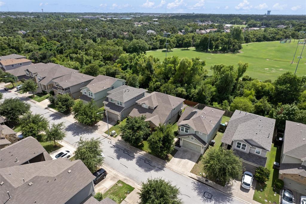 8540 White Ibis Drive Austin, TX 78729 - Photo 2 of 39 an aerial view of multiple house