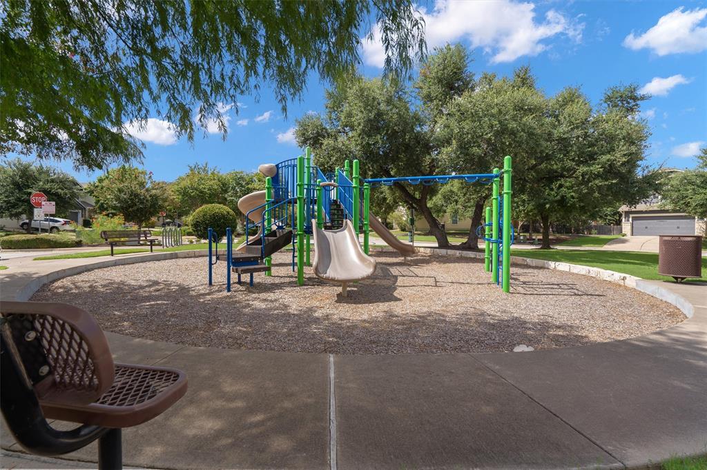 8540 White Ibis Drive Austin, TX 78729 - Photo 38 of 39 a park with kid zone