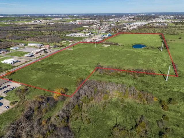 a view of a lake with a big yard