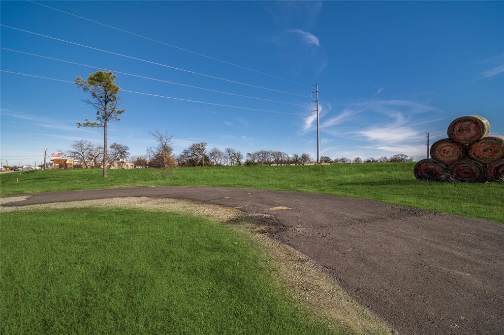 8903 Wesley Street Greenville, TX 75402 - Photo 11 of 15 a view of a green field