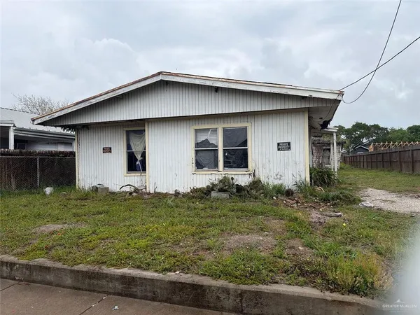 a house with garden in front of it