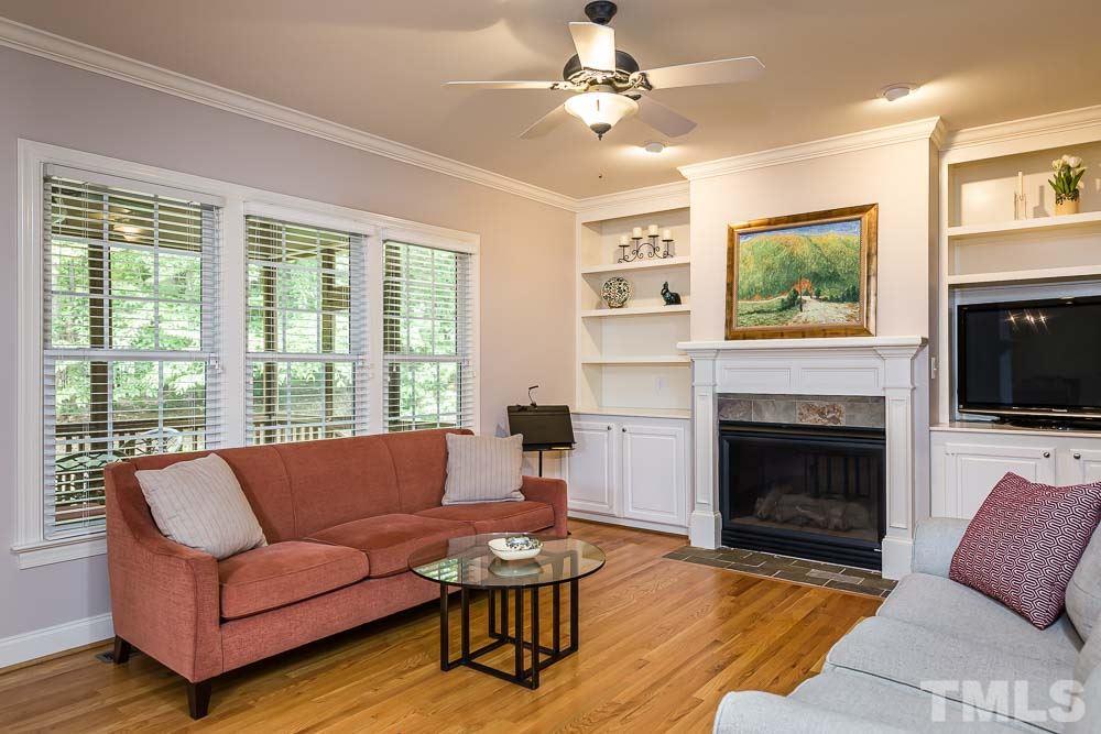 8415 Wheatstone Lane Raleigh, NC 27613 - Photo 8 of 30 Warm, yet spacious, you'll love gathering to unwind together daily.