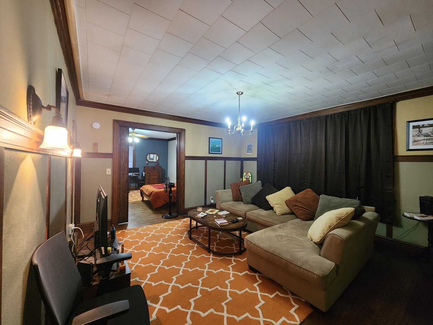 1125 Paul Street Ottawa, IL 61350 - Photo 11 of 29 a living room with furniture and a chandelier