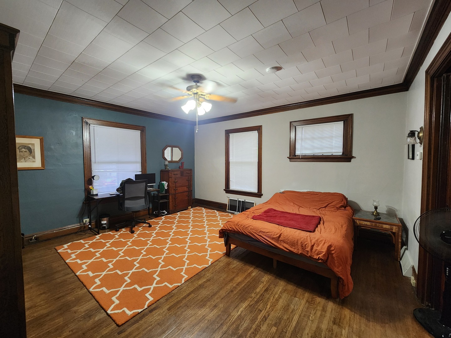 1125 Paul Street Ottawa, IL 61350 - Photo 12 of 29 a bedroom with furniture and wooden floor