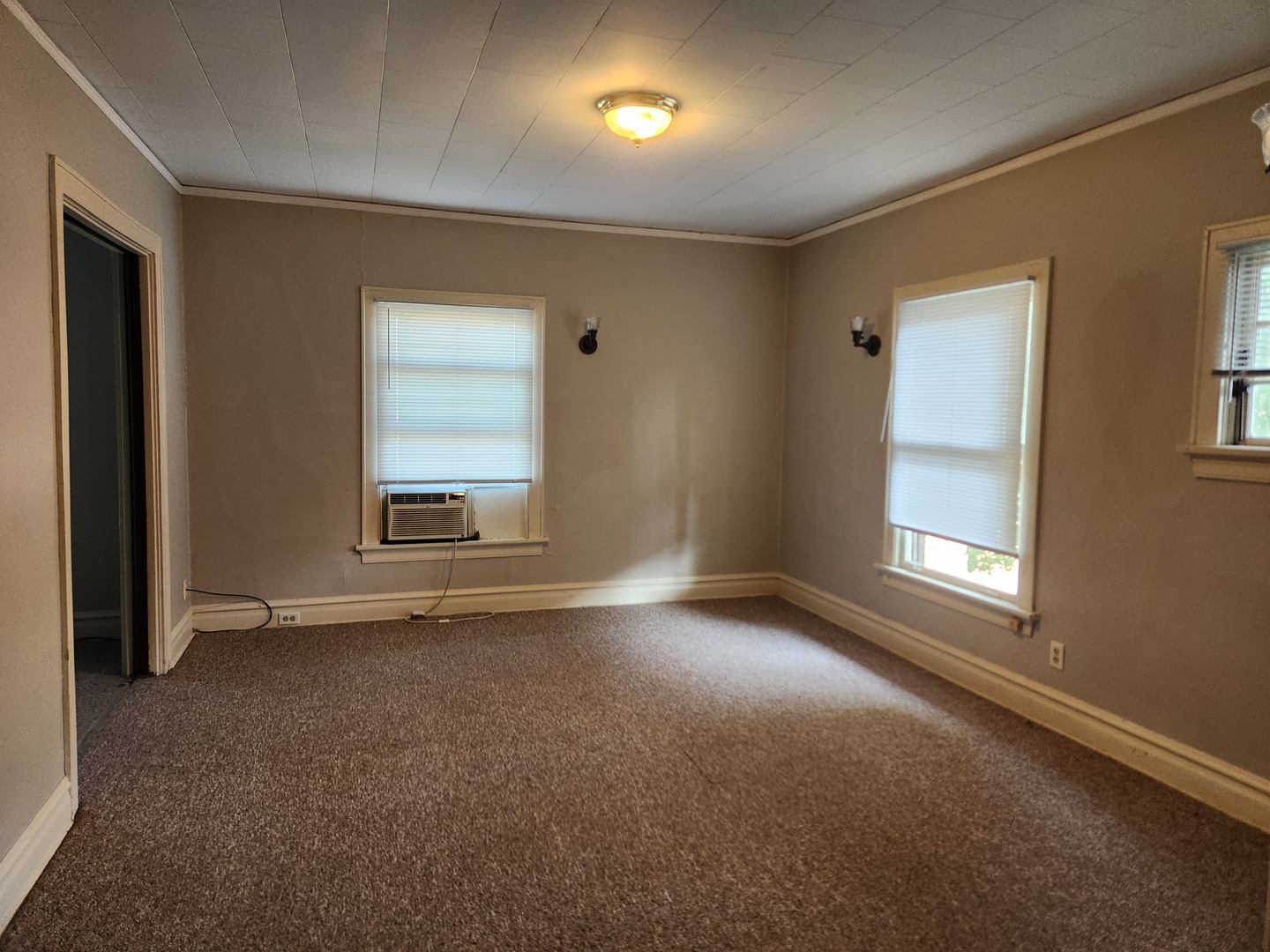 1125 Paul Street Ottawa, IL 61350 - Photo 18 of 29 an empty room with a empty space and windows