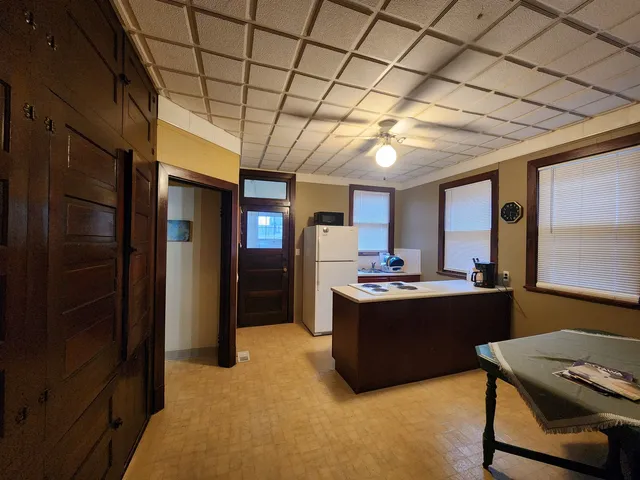 a view of a kitchen and a window