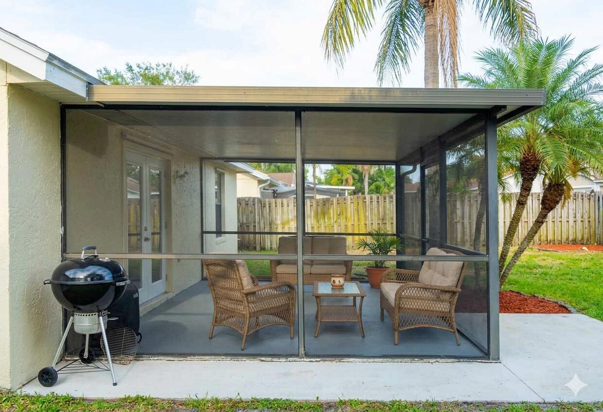 1222 Ute Street Jupiter, FL 33458 - Photo 17 of 23 16a patio with furniture