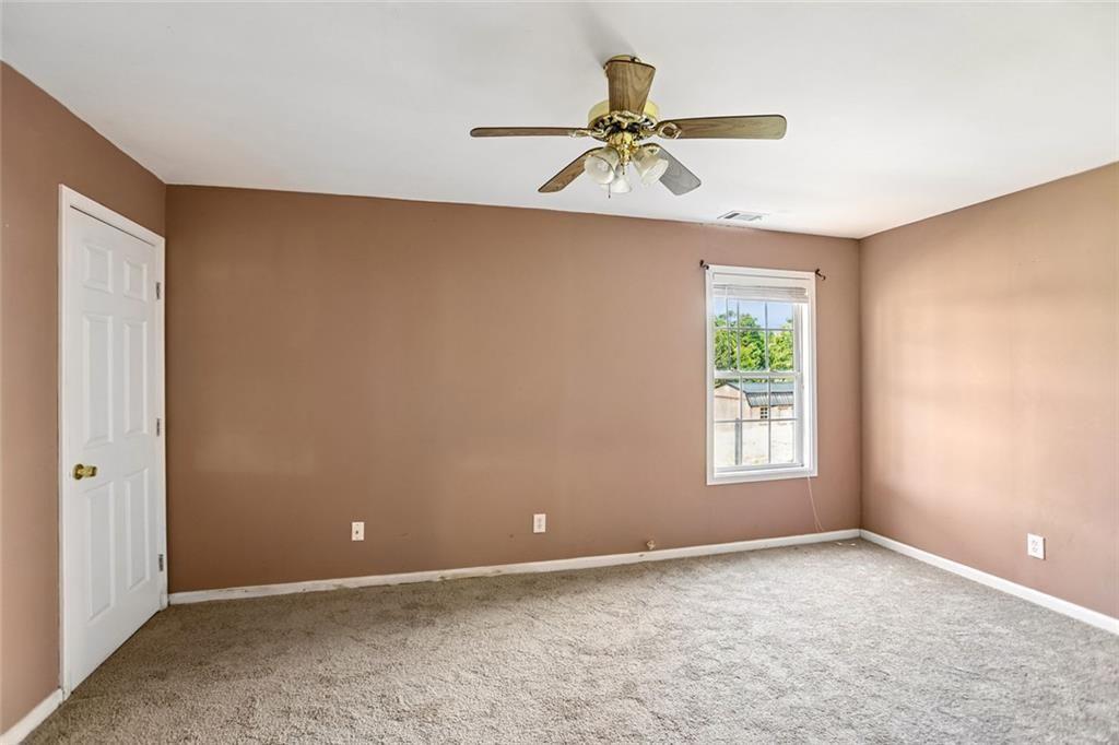 9720 Poole Road Villa Rica, GA 30180 - Photo 26 of 40 a view of an empty room and window