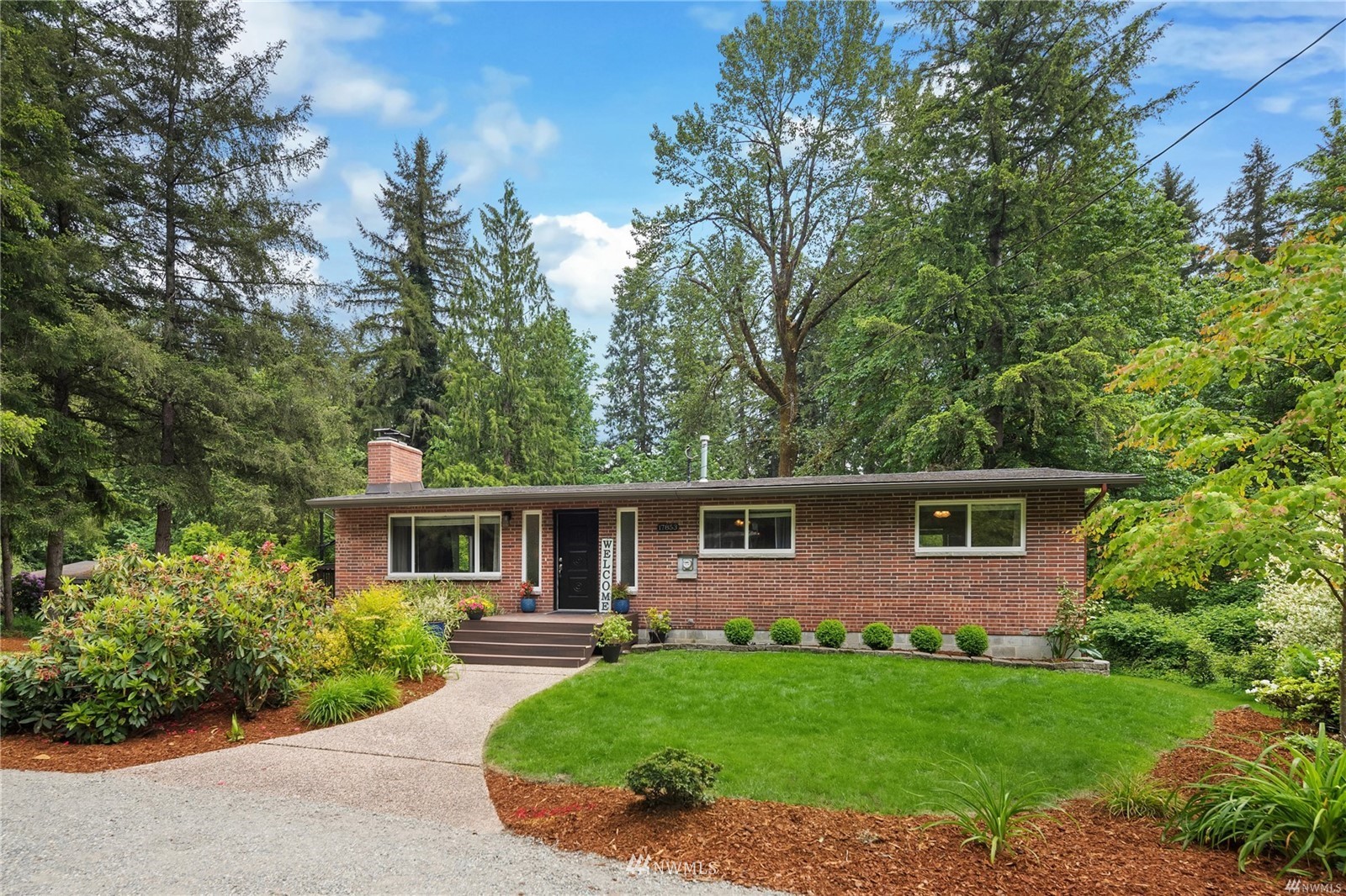 17853 Southeast 146th Street Renton, WA 98059 - Photo 1 of 26 a view of a house with a backyard