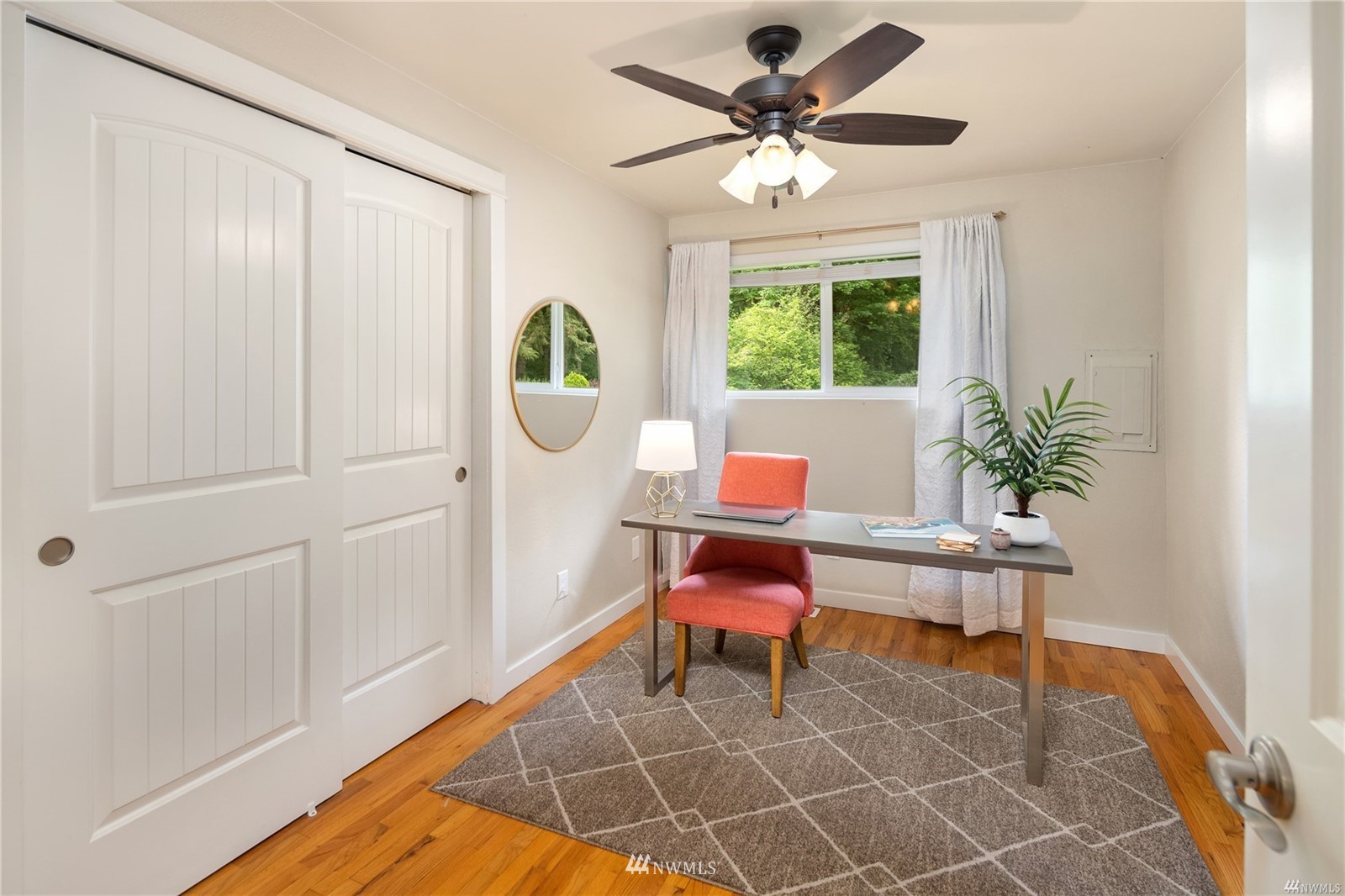17853 Southeast 146th Street Renton, WA 98059 - Photo 11 of 26 a living room with furniture a window and a potted plant