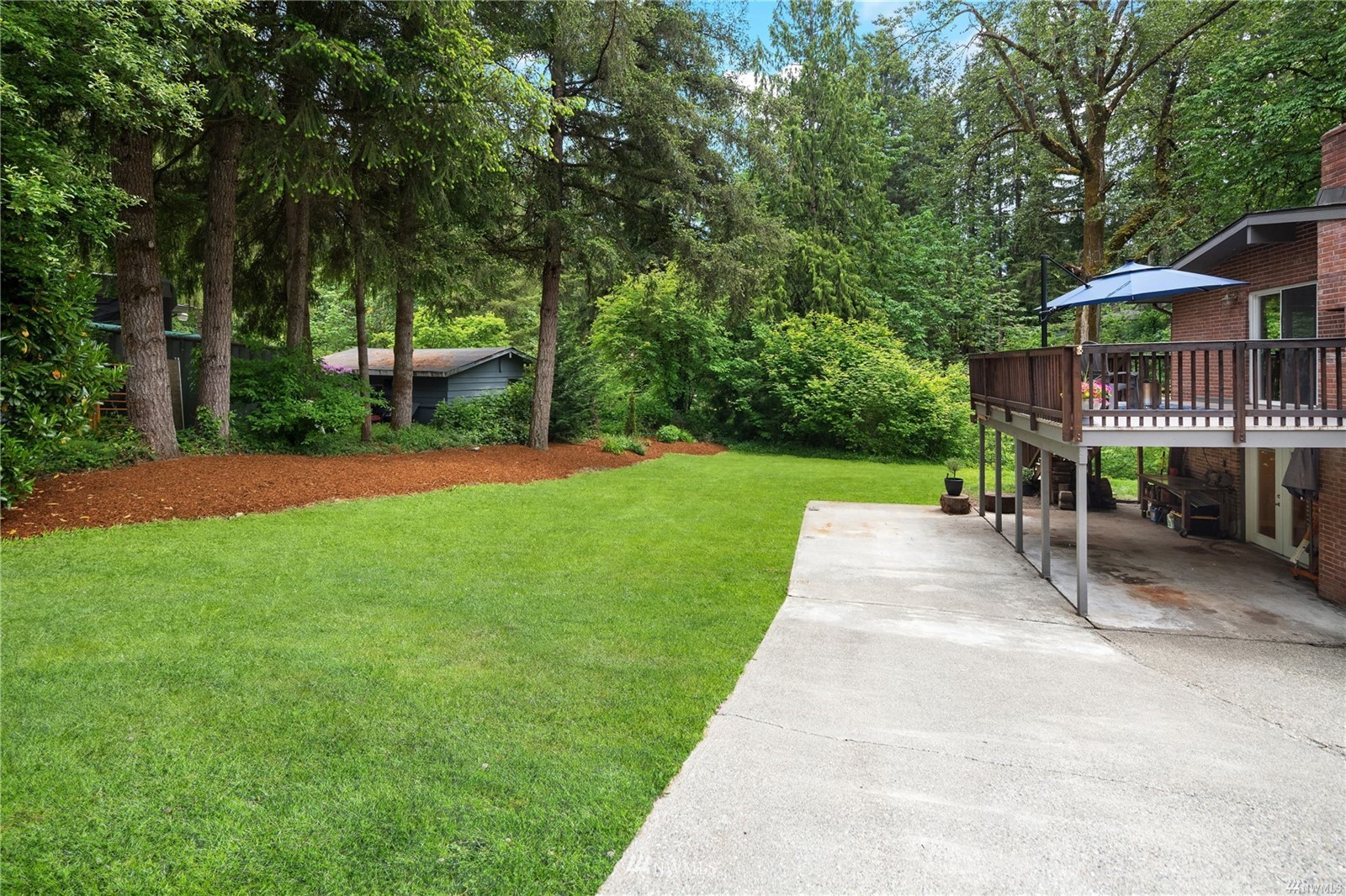 17853 Southeast 146th Street Renton, WA 98059 - Photo 23 of 26 a view of a house with a yard