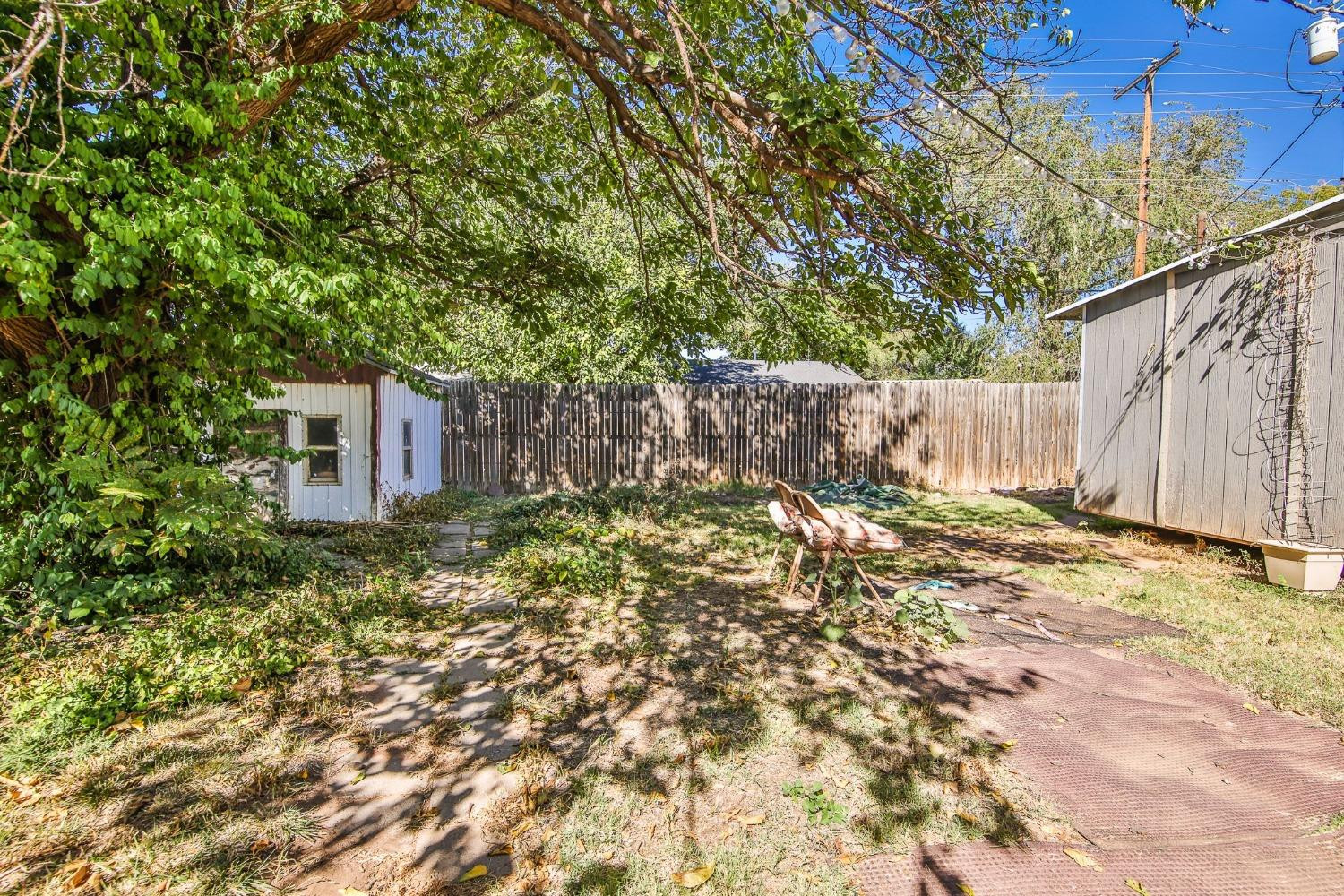 2824 63rd Street Lubbock, TX 79413 - Photo 24 of 24 a backyard of a house