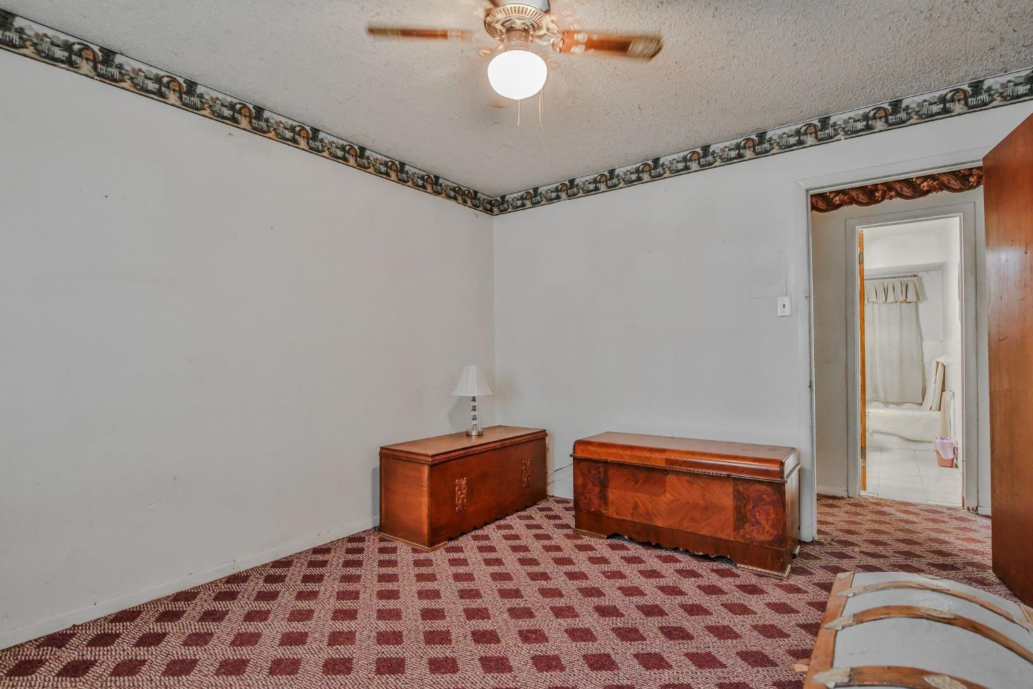 2824 63rd Street Lubbock, TX 79413 - Photo 10 of 24 a bedroom with bed and window