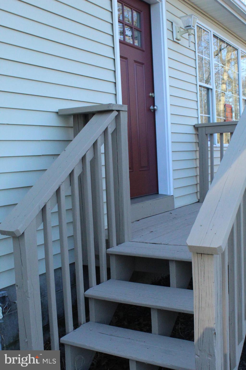 2779 Judith Road Hartly, DE 19953 - Photo 3 of 58 Front Deck and door