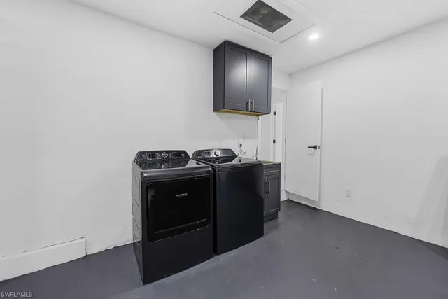 a view of living room with furniture and rug