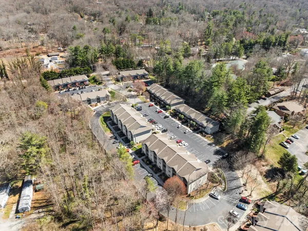 an aerial view of house with mountain view