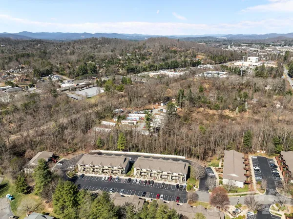 an aerial view of residential house with parking space