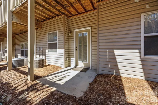 a view of a backyard with a door